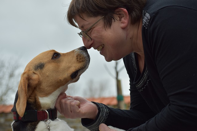 a woman being happy with her dog